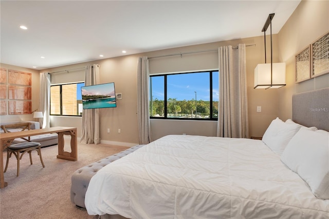 bedroom featuring light carpet