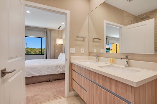 bathroom featuring vanity and tile patterned flooring