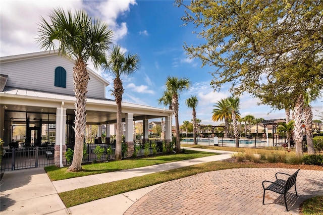 view of property's community with a swimming pool