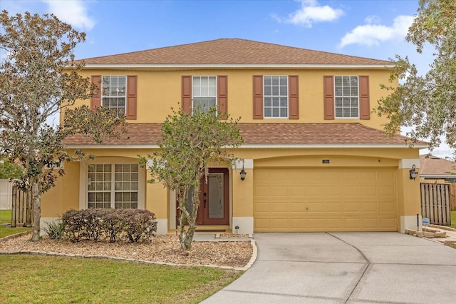 view of front of property with a garage