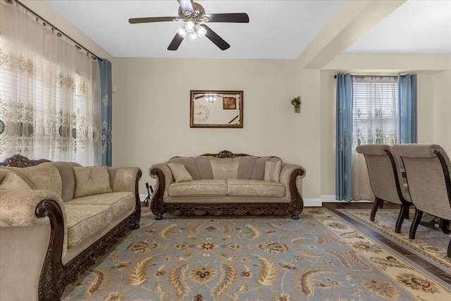 living room featuring ceiling fan