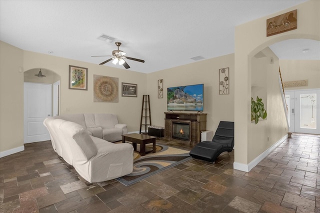 living room with ceiling fan