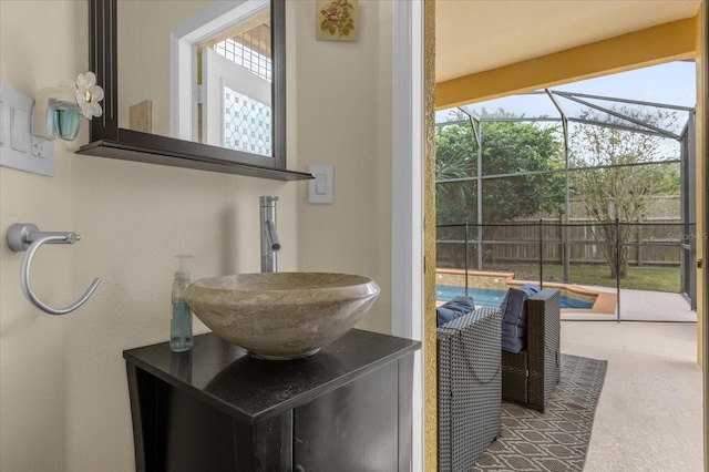 bathroom with a wealth of natural light and vanity