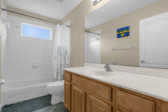 full bathroom featuring vanity, toilet, and shower / tub combo with curtain