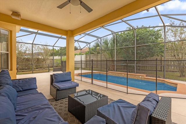 exterior space with an outdoor living space, a fenced in pool, ceiling fan, and a lanai