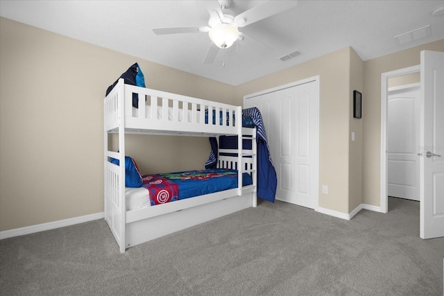 bedroom featuring carpet floors, a closet, and ceiling fan