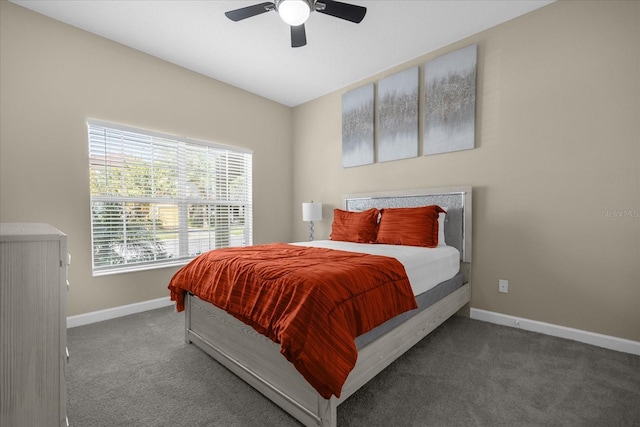 8962 Cuban Palm Rd, Kissimmee, FL 34747 - carpeted bedroom featuring baseboards and a ceiling fan
