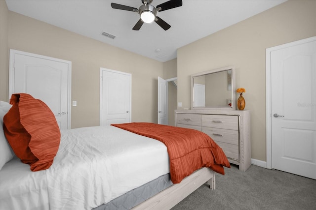 carpeted bedroom featuring ceiling fan