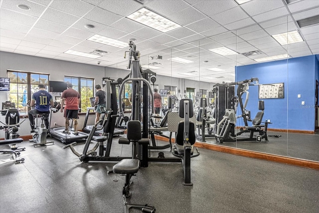8962 Cuban Palm Rd, Kissimmee, FL 34747 - gym with a paneled ceiling and baseboards