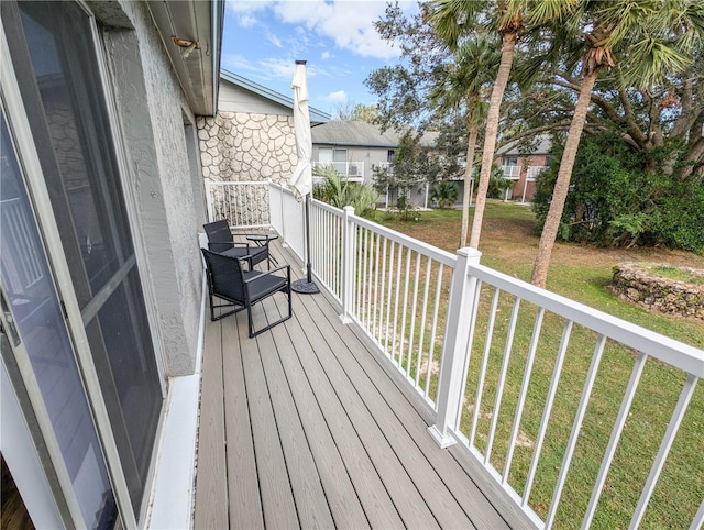 deck featuring a yard