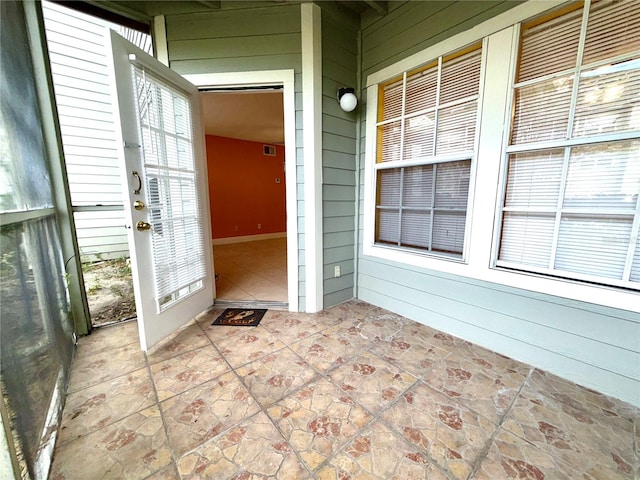 view of unfurnished sunroom