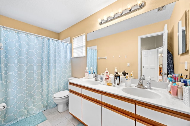 bathroom with tile patterned floors, vanity, toilet, and a shower with shower curtain