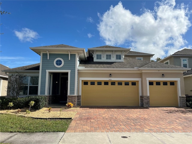 view of front of property featuring a garage