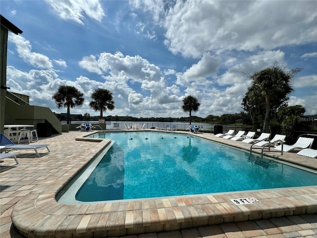 view of pool featuring a patio