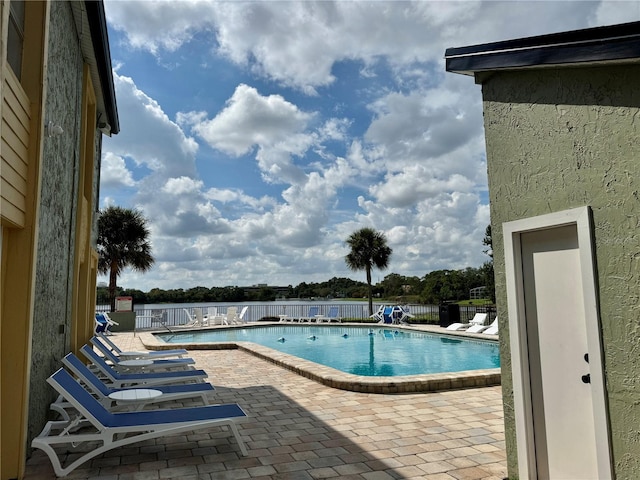 view of swimming pool featuring a patio