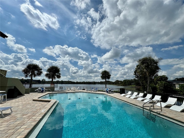 view of swimming pool featuring a patio