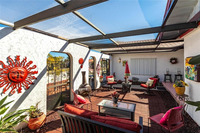 view of patio with an outdoor hangout area and a pergola