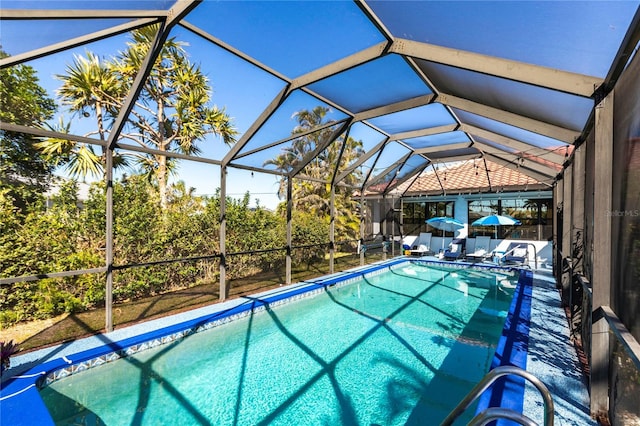 view of pool featuring a lanai