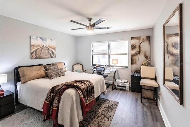 bedroom featuring dark wood-type flooring and ceiling fan