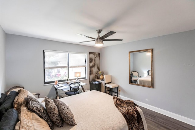 bedroom featuring wood-type flooring and ceiling fan