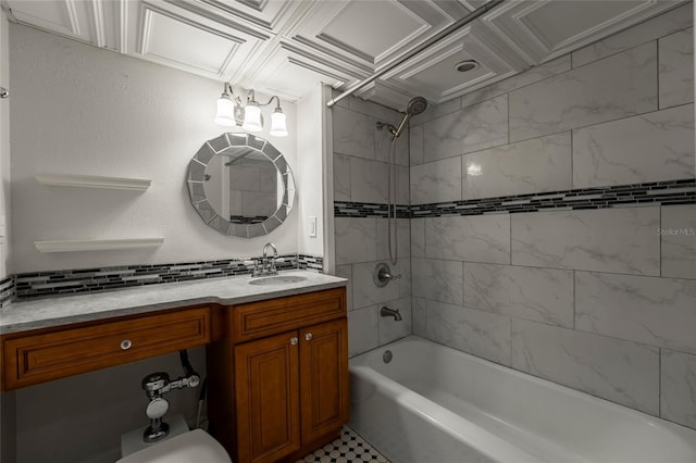 bathroom with vanity and tiled shower / bath combo