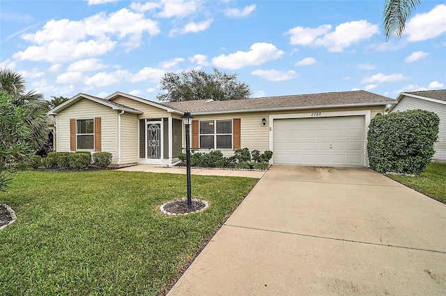 single story home featuring a front yard and a garage