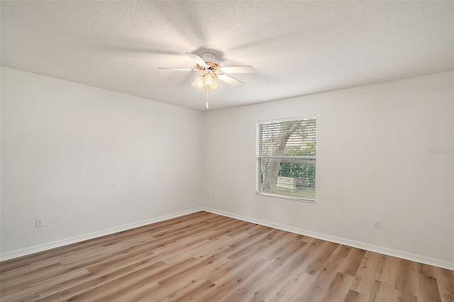 unfurnished room featuring light wood-type flooring, a textured ceiling, and ceiling fan