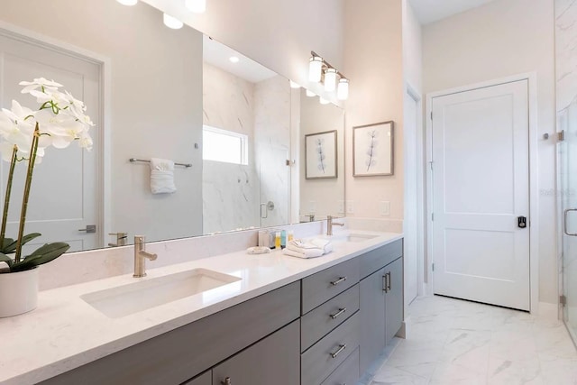 bathroom featuring walk in shower and vanity