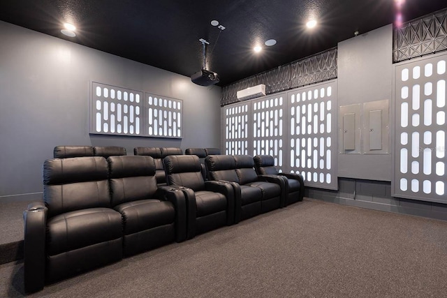 carpeted home theater with a wall unit AC