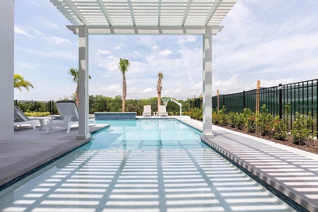 view of pool with a pergola and a patio area