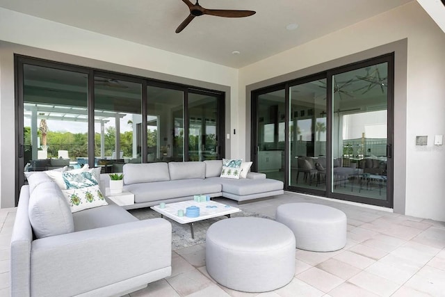 exterior space featuring light tile patterned flooring and ceiling fan