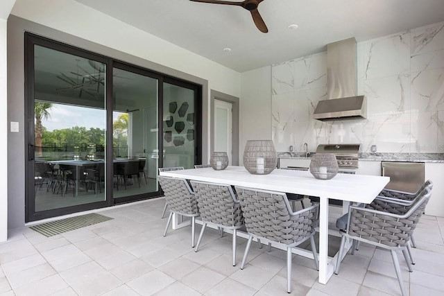 interior space featuring ceiling fan and area for grilling