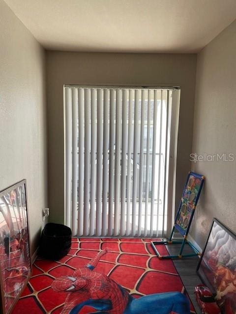 bedroom featuring multiple windows