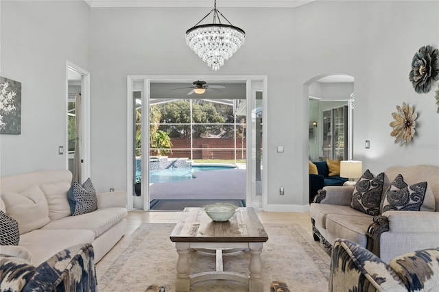 living room featuring light tile patterned floors and ceiling fan