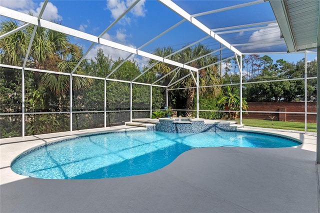 view of pool with a lanai, a patio area, and an in ground hot tub