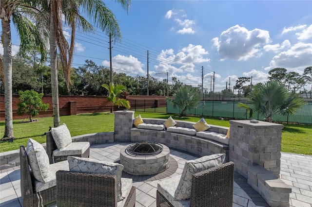 view of patio / terrace with an outdoor fire pit