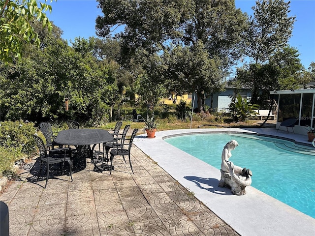 view of pool featuring a patio