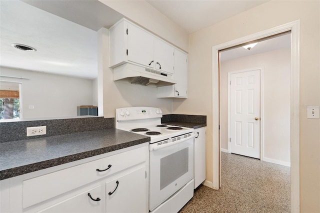 kitchen featuring white range with electric stovetop and white cabinetry