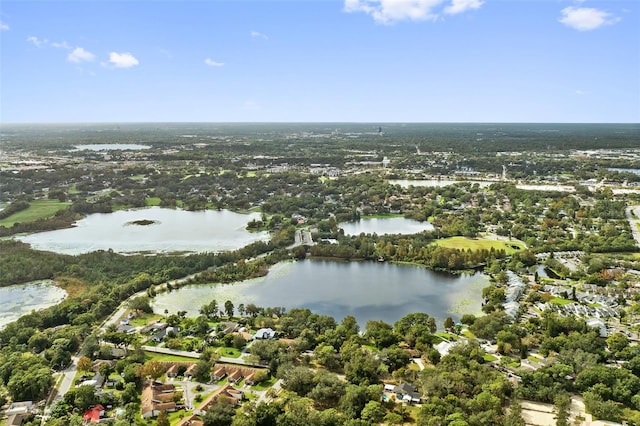 drone / aerial view with a water view