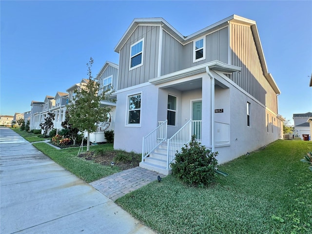 view of front of property with a front lawn