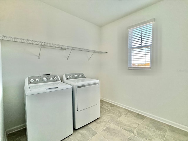 laundry area featuring separate washer and dryer