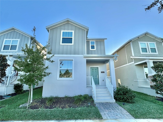 view of front of property with a front lawn