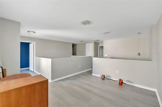 unfurnished room featuring light hardwood / wood-style flooring