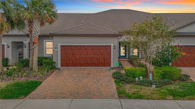 view of front of home with a garage