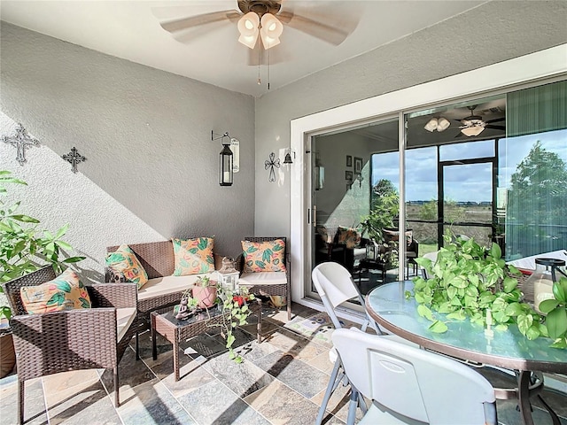 interior space featuring ceiling fan