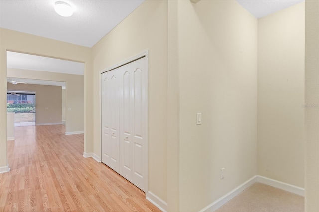 corridor featuring light wood-type flooring