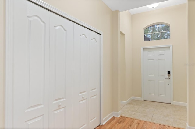 foyer entrance with light hardwood / wood-style flooring