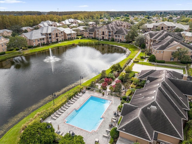 aerial view with a residential view and a water view