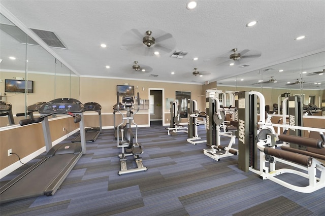 exercise room with a textured ceiling, ornamental molding, arched walkways, and visible vents