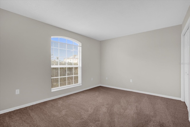 spare room with carpet flooring